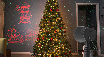 Christmas laser light projector creating a colorful festive holiday light display